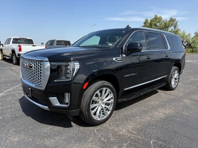 2023 GMC Yukon XL Denali in Onyx Black — front three-quarter view