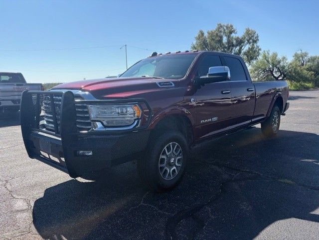 2022 RAM 3500 Longhorn in Delmonico Red Pearlcoat — front three-quarter view
